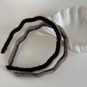 Elegant wavy velvet headbands in black and grey with delicate pearl edges for women