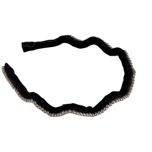 Elegant black velvet wavy headband with faux pearls for women in retro stylish design