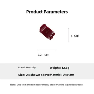 Detail view of burgundy acetate hair claw clip showing 5cm size and marble texture