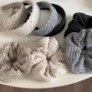 Knitted headband and scrunchie set in neutral tones with thick cable knit texture