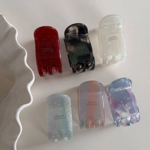 Set of 6 French style acetate hair claws in marble and glitter finishes for ponytails