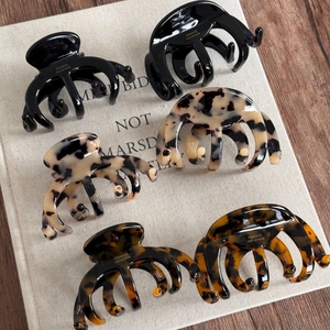 Classic octopus hair claw clips set in black and tortoise shell finish for women