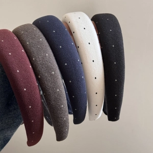 Vintage polka dot padded headbands in five classic colors with a retro fabric finish