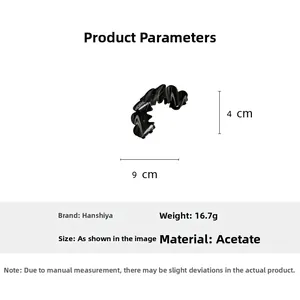 Detail view of 9cm x 4cm acetate hair claw clip with black marble ink pattern dimensions