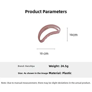 Détail montrant la taille de 10cm et la finition rose mat de la grande pince à cheveux