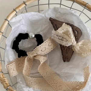 Vintage lace bow hair claw and pearl scrunchie set with flowing beige ribbons
