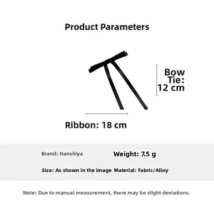 Detail showing a 12cm black fabric bow hair clip with 18cm long ribbons and alloy base