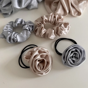 Elegant satin scrunchies and handmade rose hair ties in silver grey and champagne gold