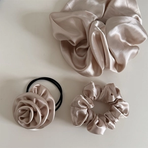 Elegant champagne satin hair scrunchies set with a handmade rose flower detail