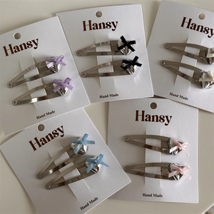 Five pairs of silver metal BB hair clips with hearts and colorful silk bows