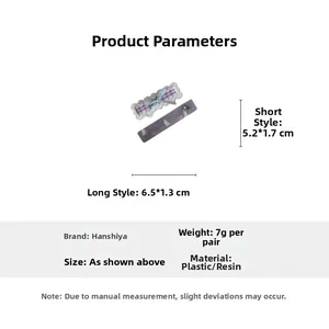 Detail showing dimensions of purple plaid bow and cat pattern hair clips set