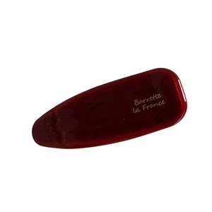 Barrette minimaliste en acétate rouge foncé avec inscription Barrette La France dorée