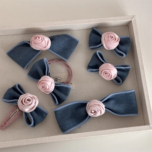 Blue denim and pink satin floral hair clip set featuring handmade rose bow hairpins