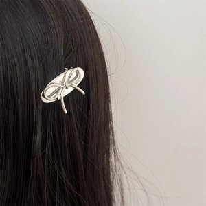 Barrette à cheveux élégante en métal argenté avec nœud papillon accessoire pour femmes