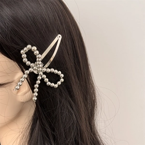 Elegant beaded bow hair clip with silver pearls and metallic BB clip base for women