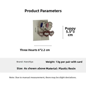 Close-up of cute cartoon puppy and heart hair clip set with specific size measurements