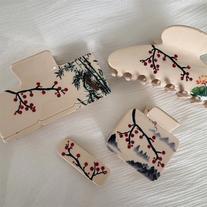 Set of four Neo-Chinese style hair claws featuring plum blossom and ink bamboo patterns