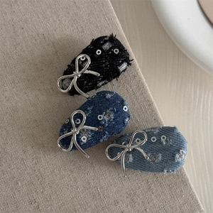 Three-piece denim hair clip set with silver bows and sequins in varied blue denim shades