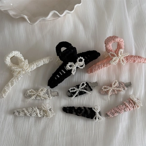 Elegant 9-piece lace pearl hair clip set with butterfly bow designs in black white and pink