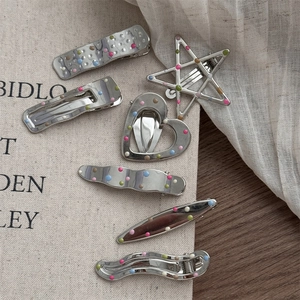 Set of silver metal hair clips with colorful polka dots in various geometric shapes