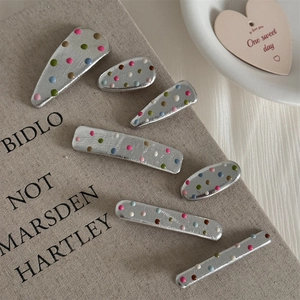Matte silver hair clips with colorful polka dots in various geometric shapes set