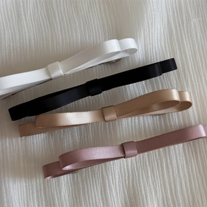Lot de quatre barrettes à nœuds élégantes en ruban gros-grain noir, blanc, rose et champagne
