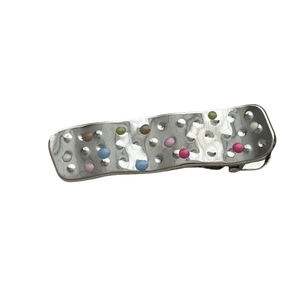 Silver metal rectangular hair clip with textured surface and colorful macaron beads