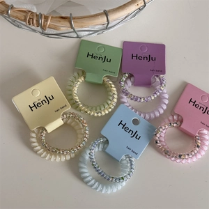 Pastel floral and solid spiral hair ties set with five macaron colors on display cards