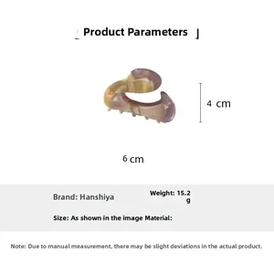 Vue détaillée de la pince à cheveux en acétate indiquant 6cm de long et 4cm de haut