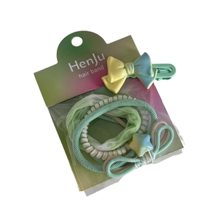 Colorful 4-piece hair accessory set with scrunchie, beaded band, cord and bow clip