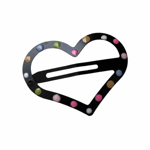 Barrette à cheveux minimaliste en forme de cœur avec pois colorés sur base noire