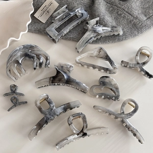 Ink marble pattern hair claw clips in various geometric shapes for women's hair styling