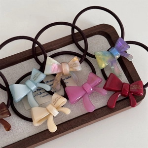 Set of minimalist acetate bow hair ties in multiple colors with high elastic bands