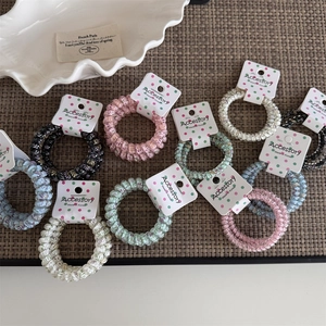 Candy colored polka dot telephone wire hair ties set with various floral and leopard patterns