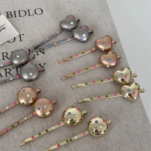 Minimalist metal hair clips with colorful dotted drip glaze in heart and round shapes