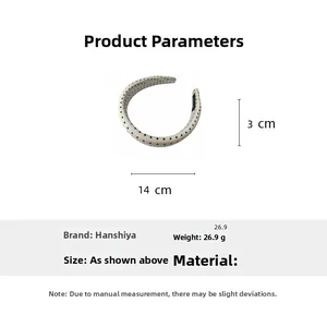 Detail view of polka dot padded headband with size specifications 14cm width and 3cm thickness