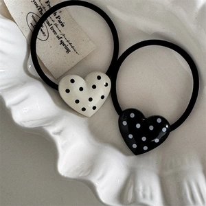 Vintage polka dot heart hair ties in black and white for high ponytail styling