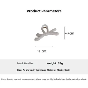 Spécifications de la pince à cheveux noeud crème montrant dimensions 13cm et poids 28g