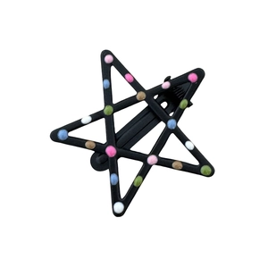 Star shaped black metal hair clip with colorful pom pom decorations for women