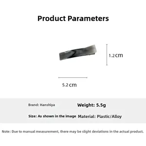 Detail view of small marble grey hair claw with precise dimensions 5.2cm by 1.2cm