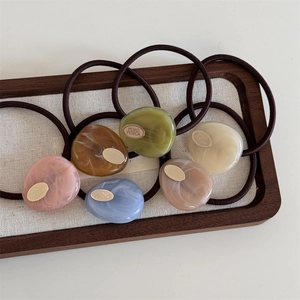 Set of 6 Morandi color marble pattern elastic hair ties in a luxury wooden tray