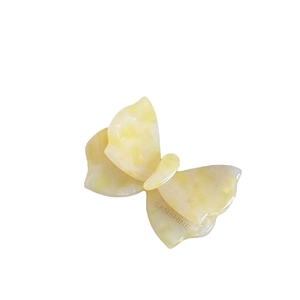 Elegante molletta per capelli a farfalla in acetato marmorizzato crema per donna