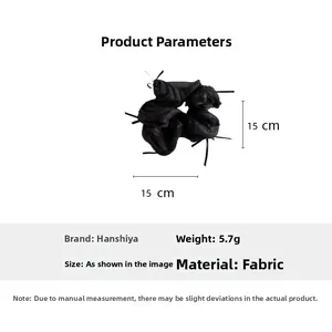 Detailed view of black tulle scrunchie with ribbons showing size 15cm x 15cm