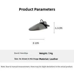 Detailed view of silver bow hair clip with dimensions of 8cm length and leather texture