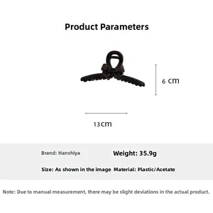 Dimensions détaillées d'une pince à cheveux noire en acétate avec nœud, longueur 13 cm