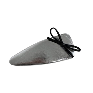 Silver metallic hair clip with a chic black bow for a cool and minimalist hairstyle look