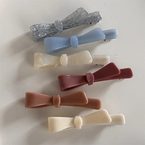 Set of 6 colorful acetate bow hair clips with glitter and matte finish for women