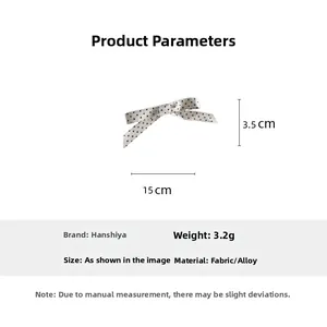 Detailansicht der gepunkteten Haarklammer mit Maßen von 15 cm mal 3,5 cm Größe
