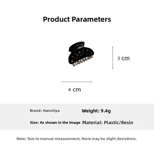 Dettaglio del fermaglio nero 4x3cm con strass colorati, dal peso di 9,4 grammi