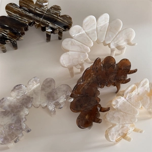 Elegant large acetic acid flower petal hair clips in various marble patterns and colors